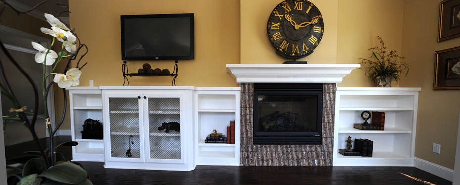 White painted fireplace bookcases with wire mesh