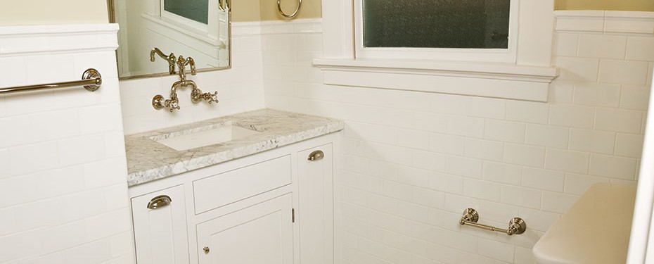 white painted Craftsman style bathroom cabinets
